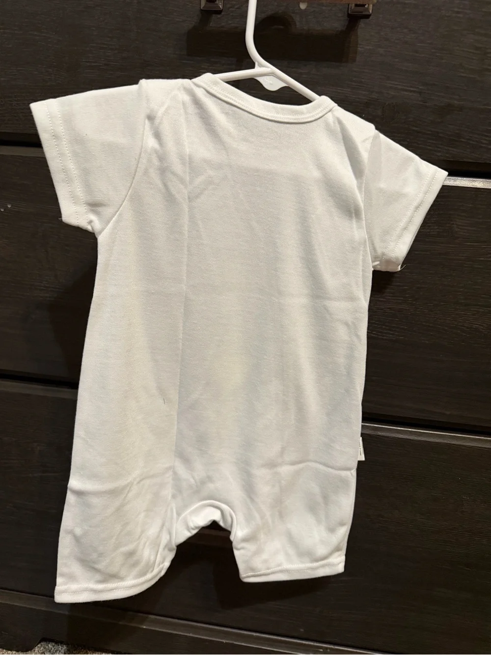 White Baby Romper with Red Heart & 'I'm Not Spoiled' Graphic